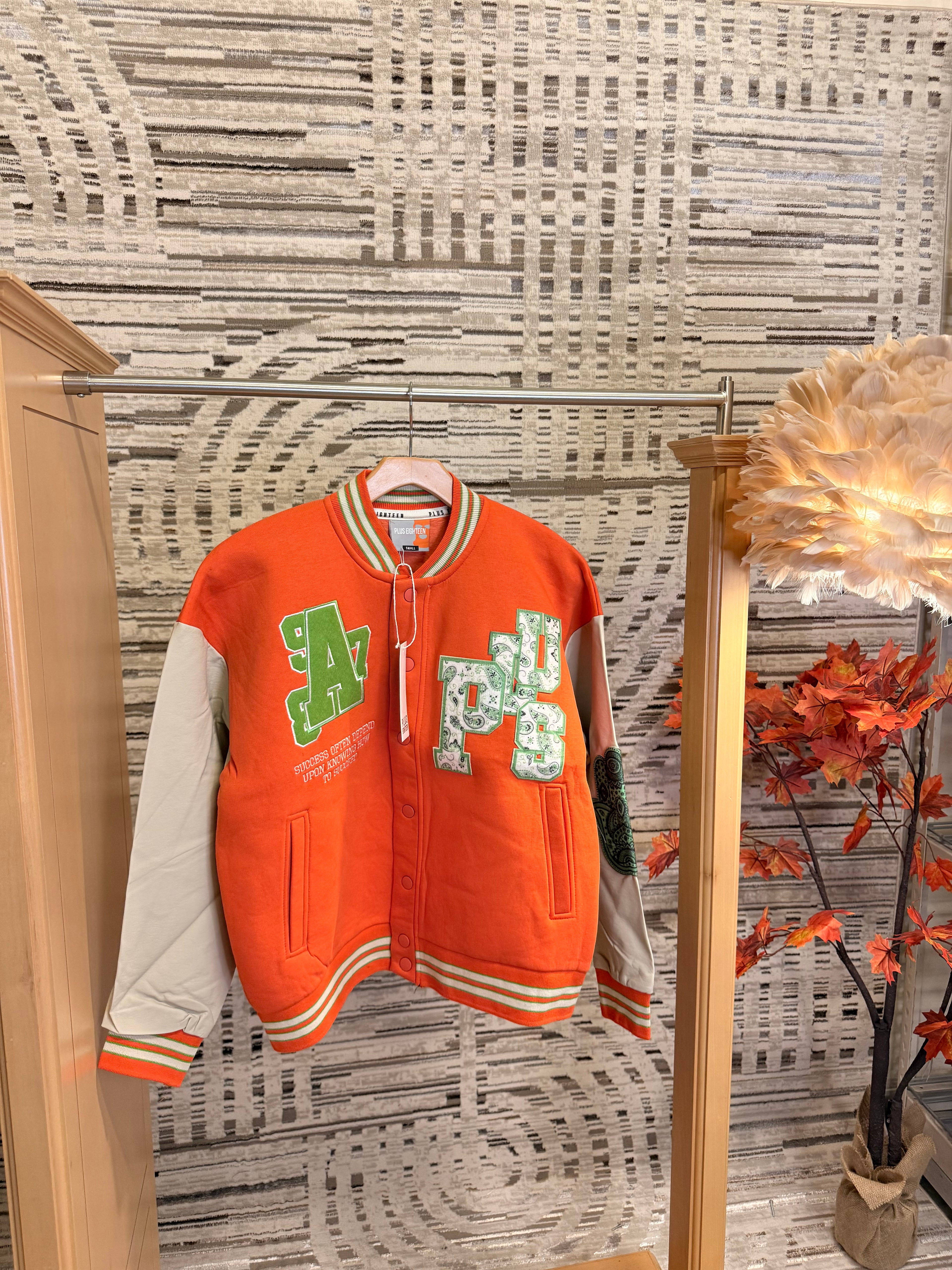 Orange Off the system varsity jacket