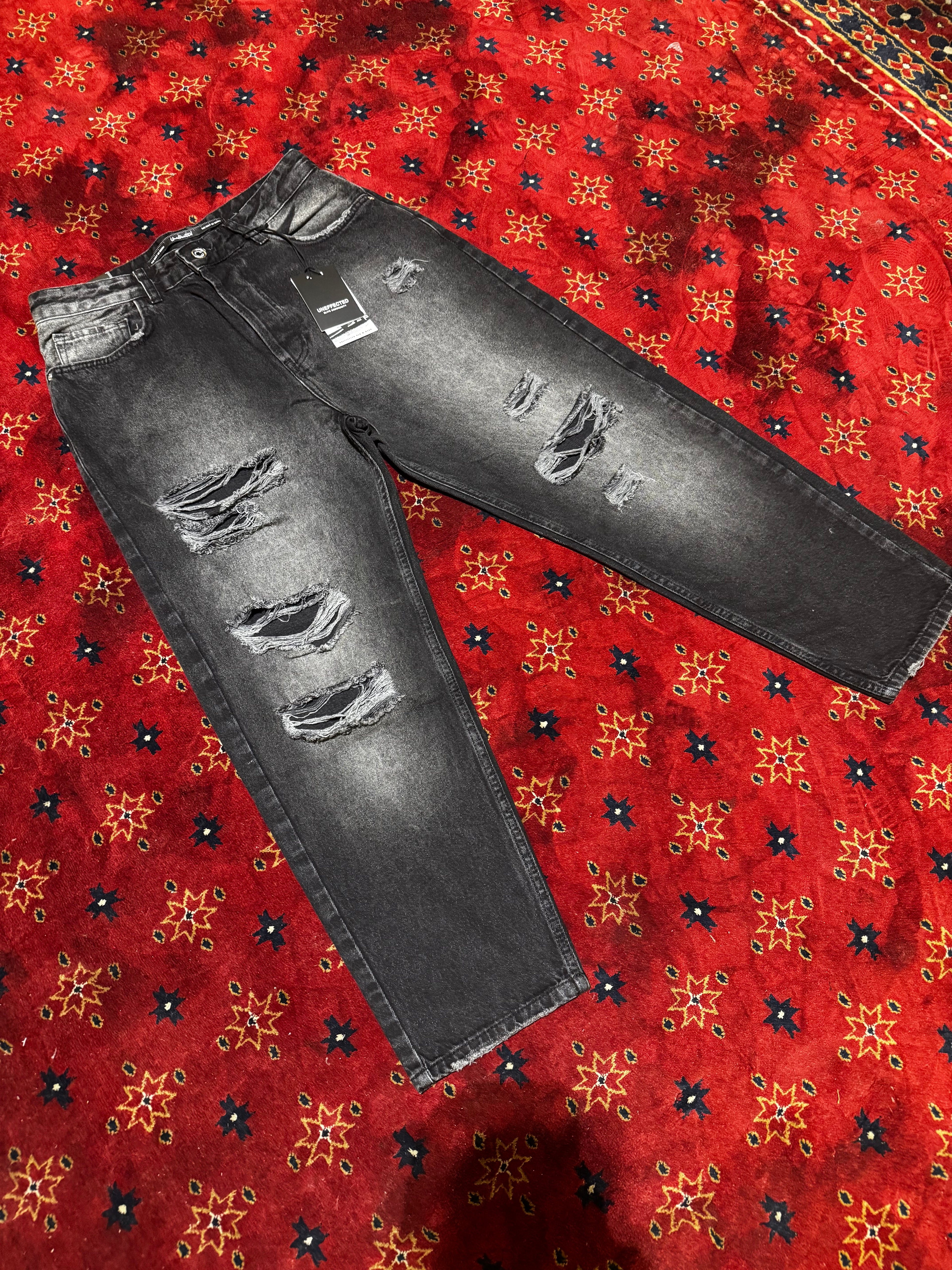 Uneffected Black straight distressed pants