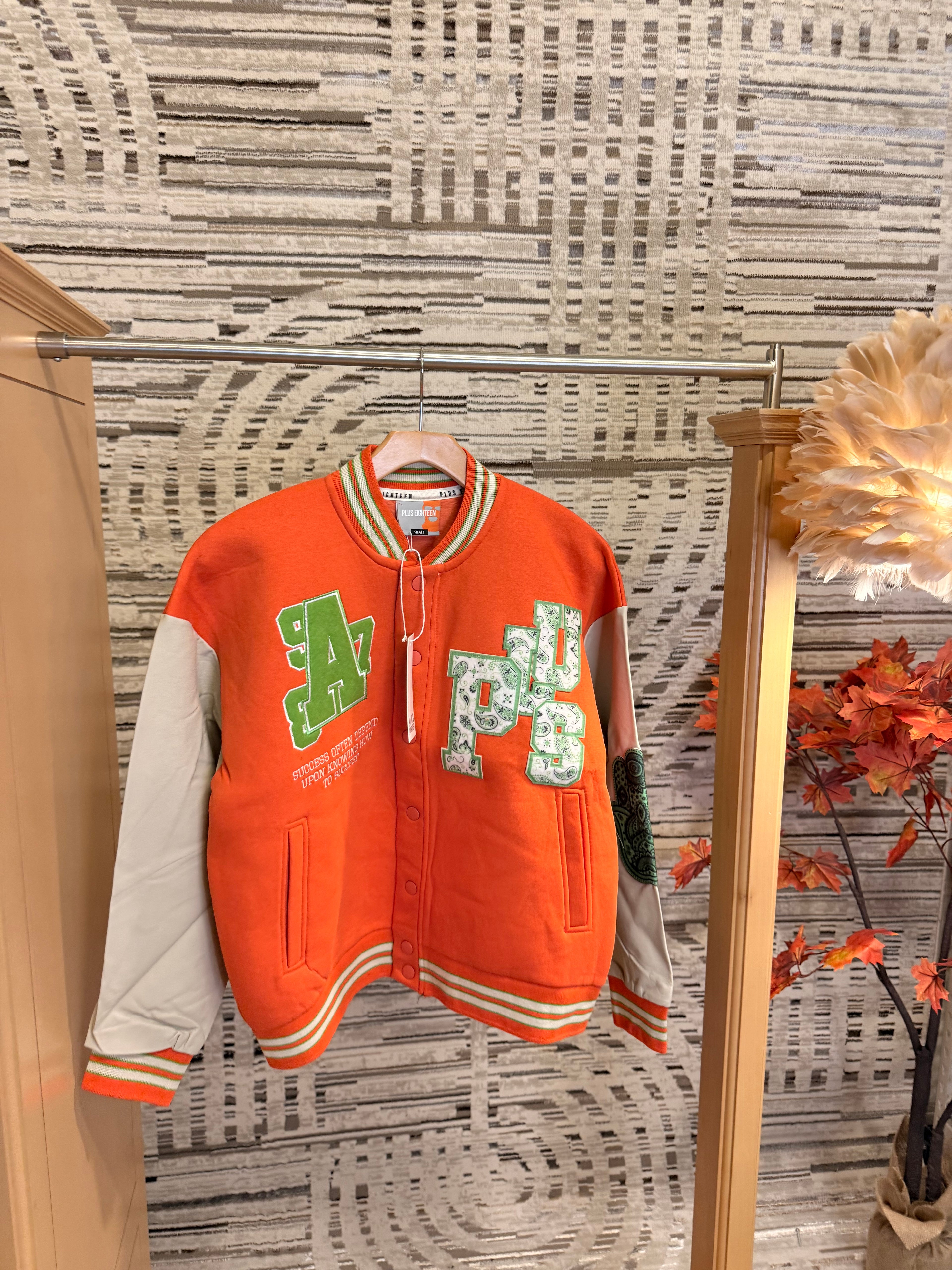 Orange Off the system varsity jacket