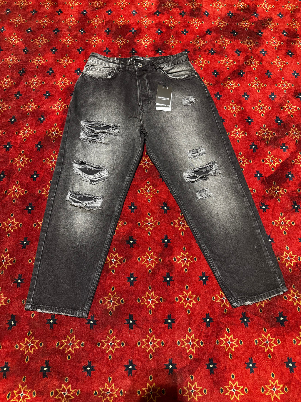 Uneffected Black straight distressed pants