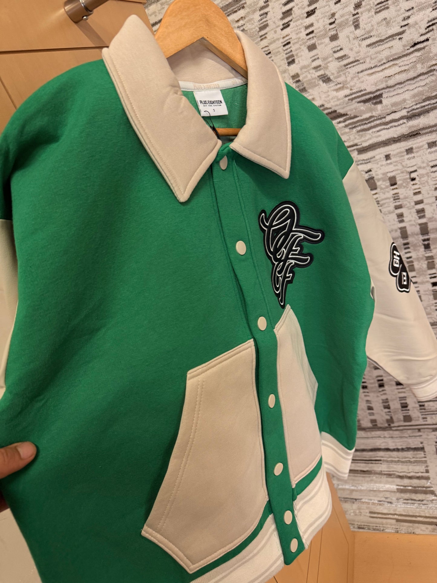 Off the system varsity jacket