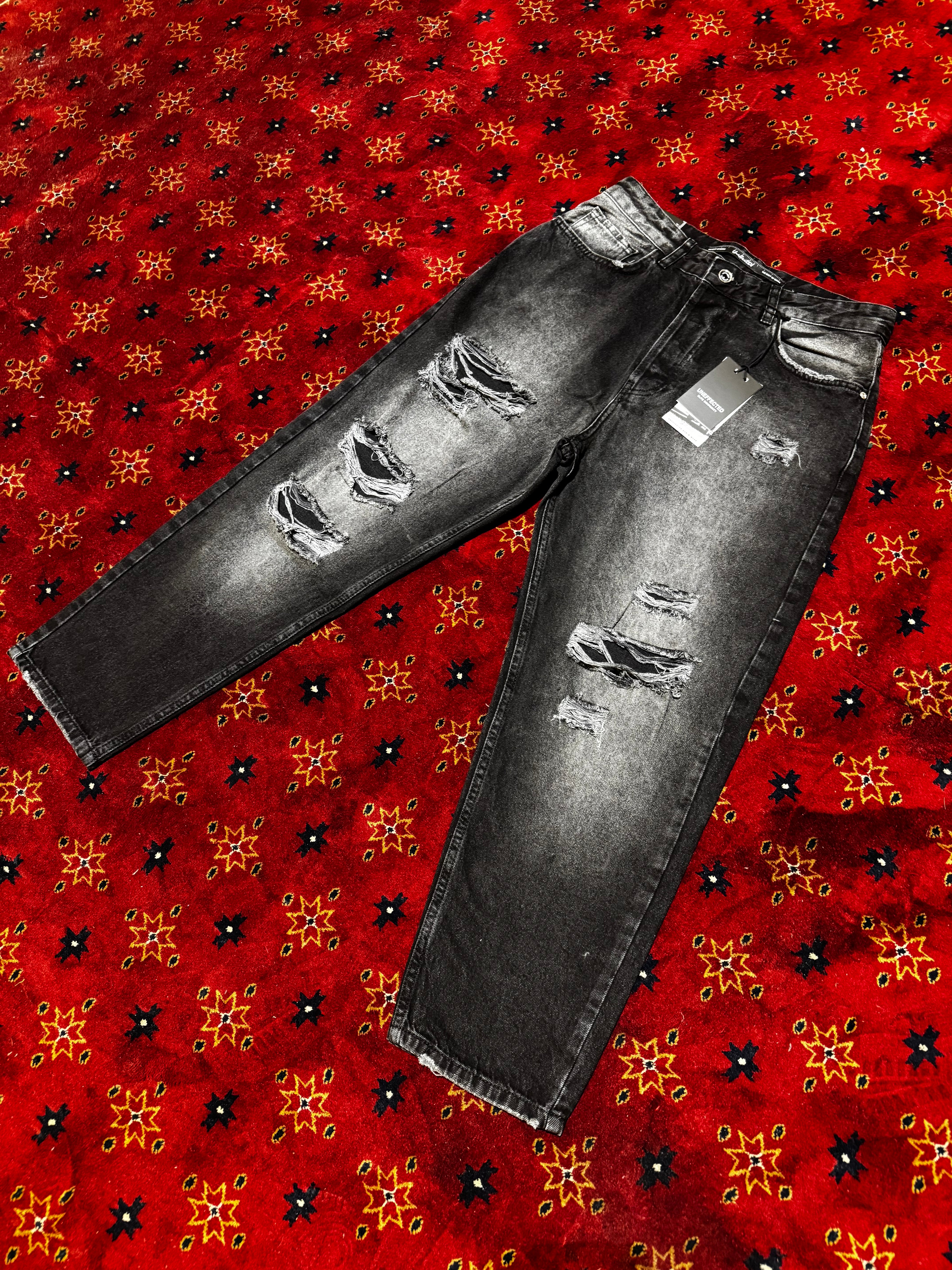 Uneffected Black straight distressed pants